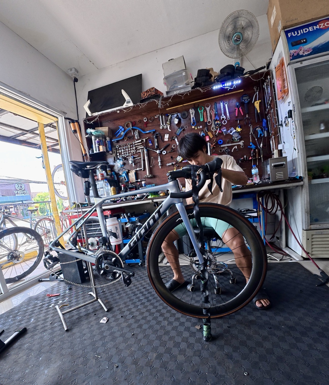 Bike Kings mechanic servicing a bike in the shop